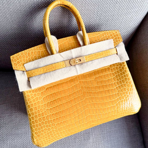 Birkin 25 Jaune Ambre Shiny Porosus