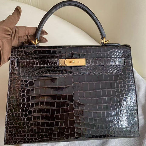Kelly 32 Sellier Ebene Shiny Porosus